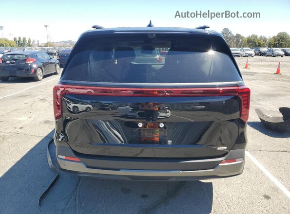 KNDNE5KA7S6055099 2025 KIA CARNIVAL Black Rear view