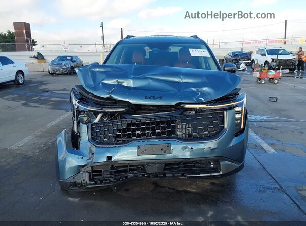 KNDNE5KAXS6076433 2025 KIA CARNIVAL MPV HYBRID Синий Вид задней части салона