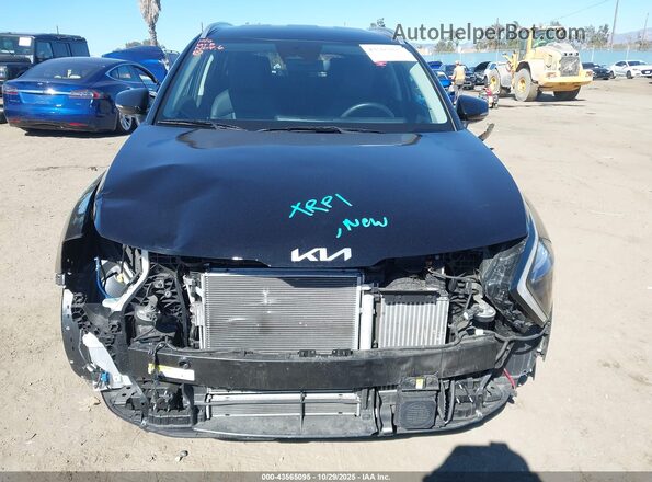 KNDPVCAG2P7104052 2023 KIA SPORTAGE HYBRID Черный Вид задней части салона