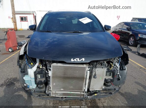 KNDPVCAG3P7028809 2023 KIA SPORTAGE HYBRID Черный Вид задней части салона