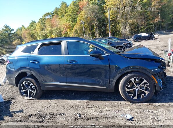 KNDPVCDG0R7173756 2024 KIA SPORTAGE HYBRID Dark Blue Widok wnętrza z tyłu