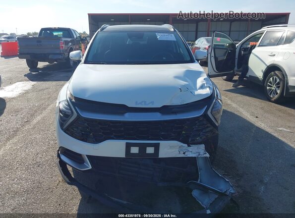 KNDPVCDG3S7243465 2025 KIA SPORTAGE HYBRID White Սարքավորումների վահանակի տեսք