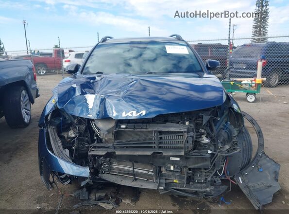 KNDPZDAH6P7068420 2023 KIA SPORTAGE PLUG-IN HYBRID Blue Vista interior trasera