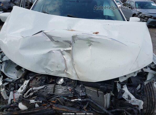 KNMAT2MV8JP525443 2018 NISSAN ROGUE White Rear view