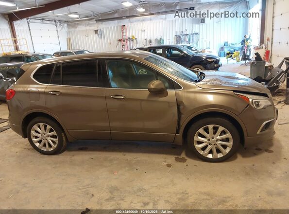 LRBFXESXXGD211494 2016 BUICK ENVISION Brown Вид задньої частини салону