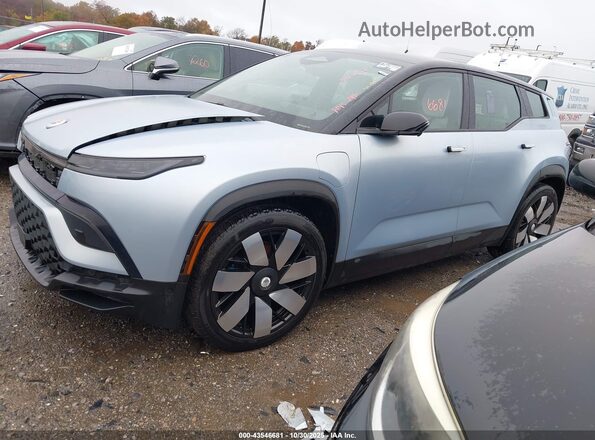 VCF1EBU2XPG007696 2023 FISKER OCEAN Light Blue Vista tres cuartos delantera izquierda