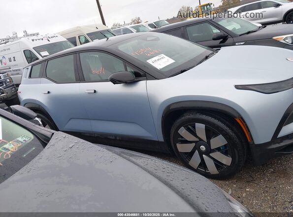 VCF1EBU2XPG007696 2023 FISKER OCEAN Light Blue Vista interior trasera