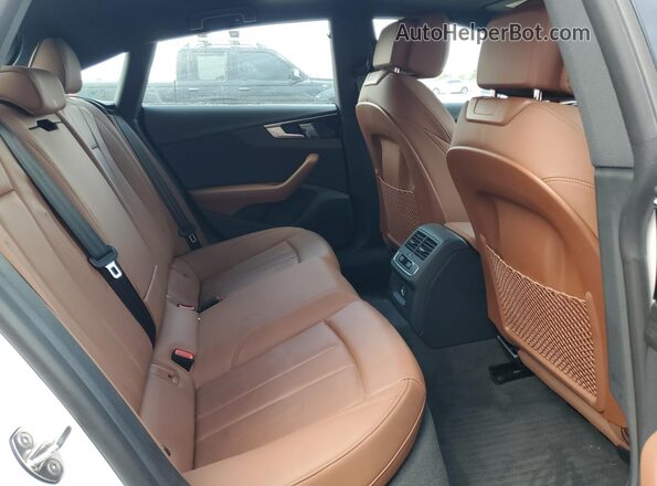 WAUDACF57RA079089 2024 AUDI OTHER White Vista de los asientos traseros