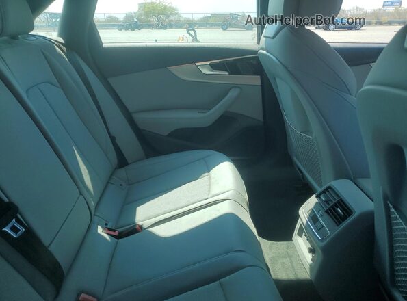 WAUEAAF49RN011241 2024 AUDI OTHER Green Vista de los asientos traseros
