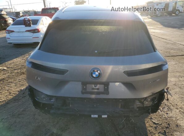 WB523CF03RCR15800 2024 BMW IX Silver Rear view
