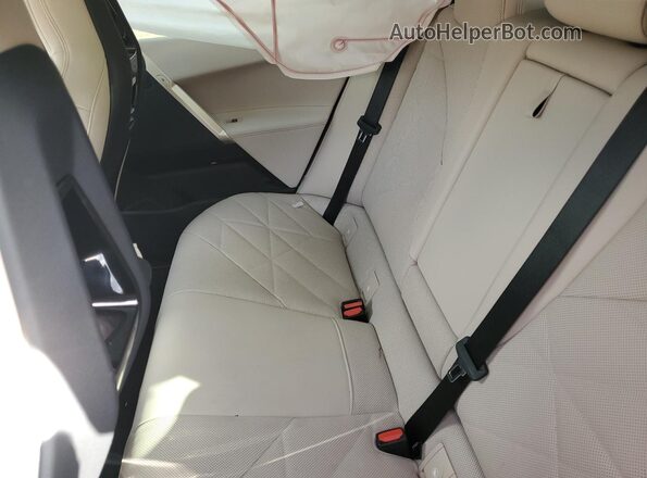 WB523CF05RCP41602 2024 BMW IX Blue Vista interior trasera