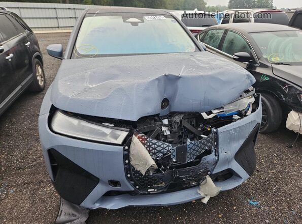 WB523CF05RCP41602 2024 BMW IX Blue Vista trasera