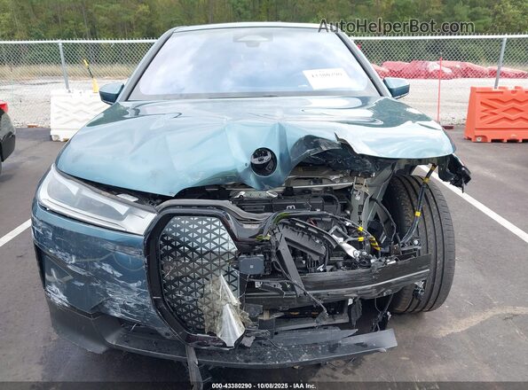 WB523CF06PCM07589 2023 BMW IX Turquoise Vista frontal