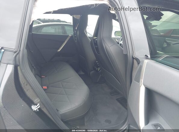 WB523CF06PCM07589 2023 BMW IX Turquoise Vista de la etiqueta del VIN