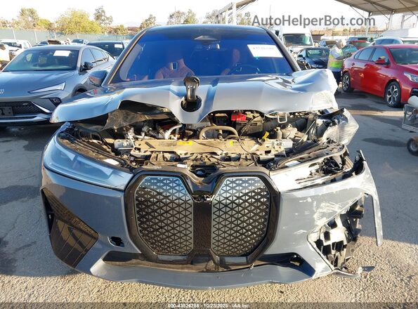 WB523CF06SCT60704 2025 BMW IX Gray Instrument cluster view