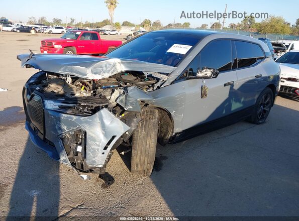 WB523CF06SCT60704 2025 BMW IX Gray Front left
