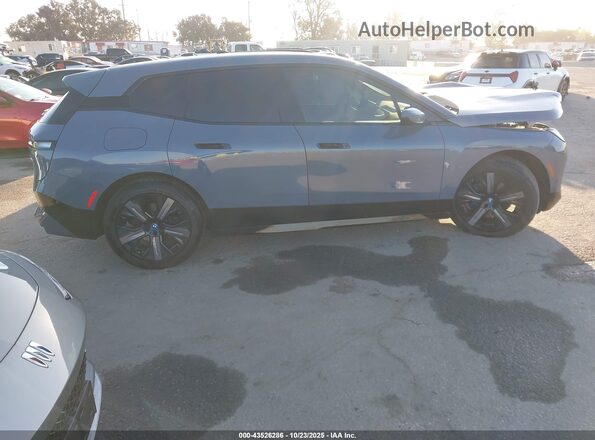 WB523CF06SCT60704 2025 BMW IX Gray Rear interior view
