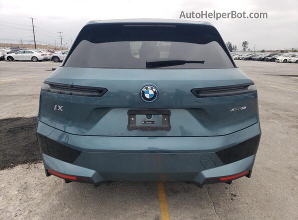 WB523CF07RCR72663 2024 BMW IX Бирюзовый Вид сзади