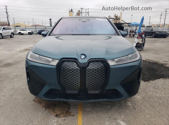 WB523CF07RCR72663 2024 BMW IX Бирюзовый Вид спереди