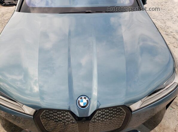 WB523CF09SCT73754 2025 BMW IX Teal Widok komory silnika