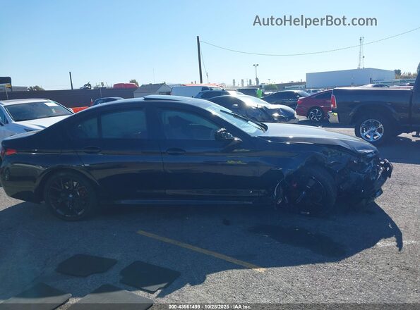 WBA13AG05NCK28828 2022 BMW 5 SERIES Black Widok wnętrza z tyłu