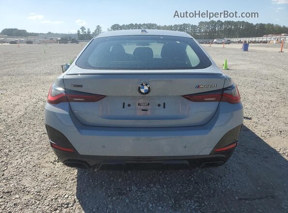 WBA13AW02NFM14858 2022 BMW M4 Gray Widok z tyłu