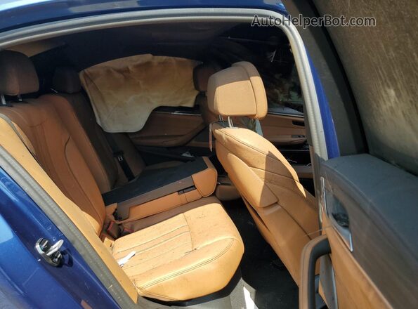 WBA13BK08PCM19840 2023 BMW M5 Blue უკანა სავარძლების ხედი