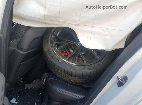 WBA13BK09NCH70708 2022 BMW M5 White Widok tylnych siedzeń