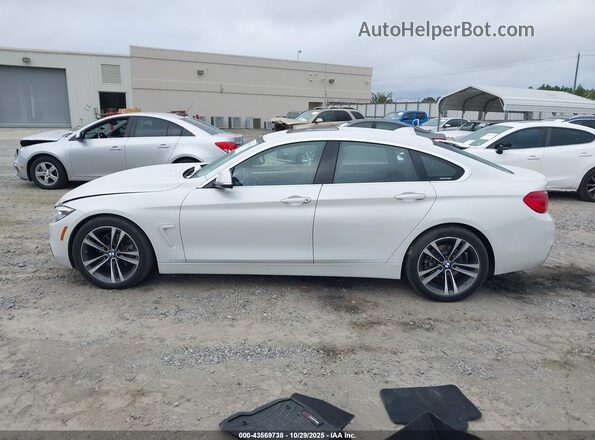 WBA4J1C07LBU68295 2020 BMW 4 SERIES White 360 interior view