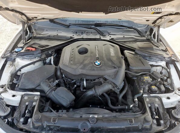 WBA4J1C53JBM11021 2018 BMW 4 SERIES White Widok wnętrza z tyłu