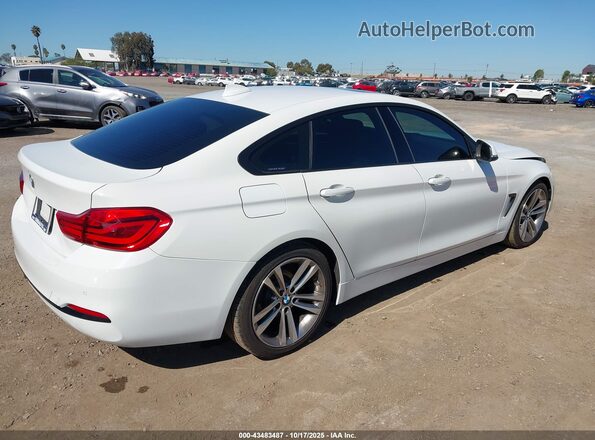 WBA4J1C55JBM11375 2018 BMW 4 SERIES White Tył prawy