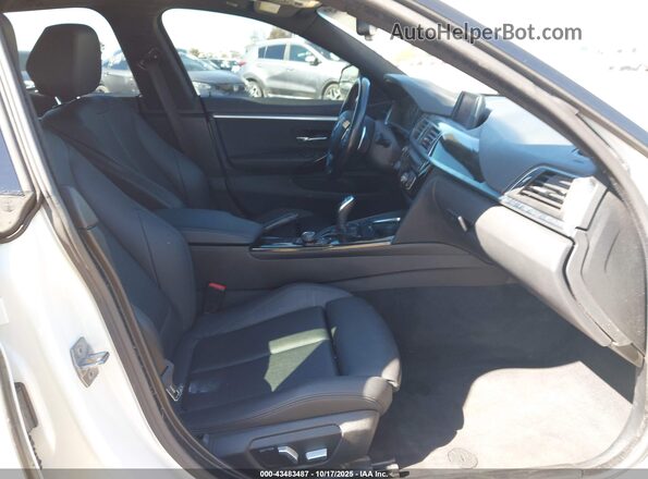 WBA4J1C55JBM11375 2018 BMW 4 SERIES White Widok wnętrza z przodu