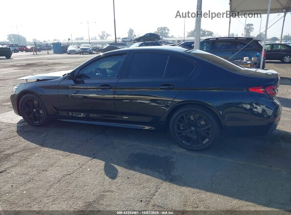 WBA53BH04NCJ25177 2022 BMW 5 SERIES Black Widok wnętrza z tyłu