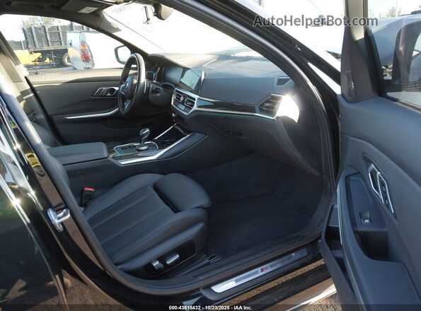 WBA5R1C06MFL37589 2021 BMW 3 SERIES Black Front interior view