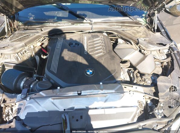 WBA5U7C03LFH34499 2020 BMW 3 SERIES Gray Vista trasera
