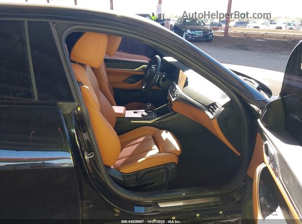 WBA63AV01NFM07391 2022 BMW 4 SERIES Black Vista interior delantera