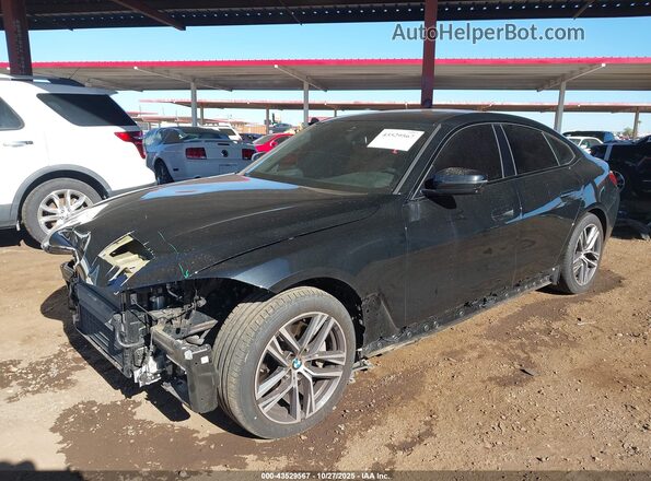 WBA63AV01NFM07391 2022 BMW 4 SERIES Black Vista tres cuartos delantera izquierda