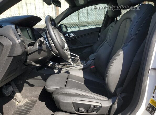 WBA73AK04M7G48236 2021 BMW 2 SERIES White Front interior view