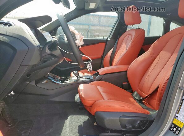 WBA73AK0XP7M24261 2023 BMW 2 SERIES Gray Vista interior delantera