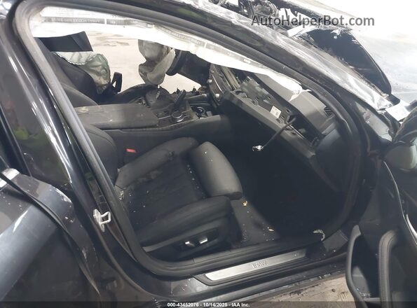 WBA73BJ02MWX01168 2021 BMW 5 SERIES Black Front interior view