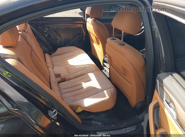 WBA73BJ05MCF83542 2021 BMW 5 SERIES Black VIN կոդի պիտակի տեսք