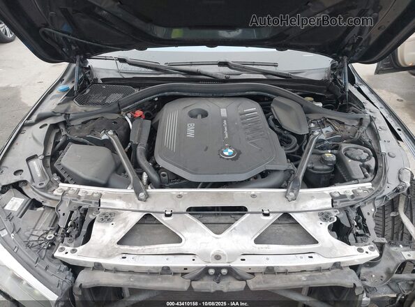 WBA7E2C52JG741730 2018 BMW 7 SERIES Black Widok z tyłu
