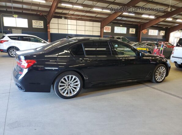 WBA7E4C56KGV70560 2019 BMW 7 SERIES Black Tył prawy