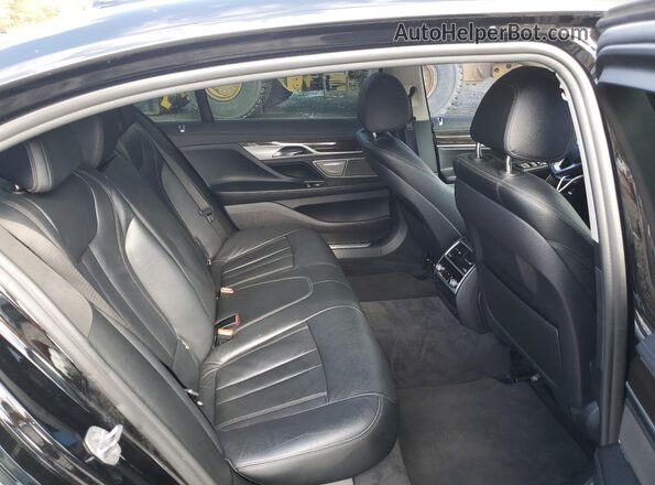 WBA7E4C57KGV28348 2019 BMW 7 SERIES Black Vista interior trasera