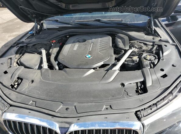 WBA7E4C58KGV28584 2019 BMW 7 SERIES Black Widok wnętrza z tyłu