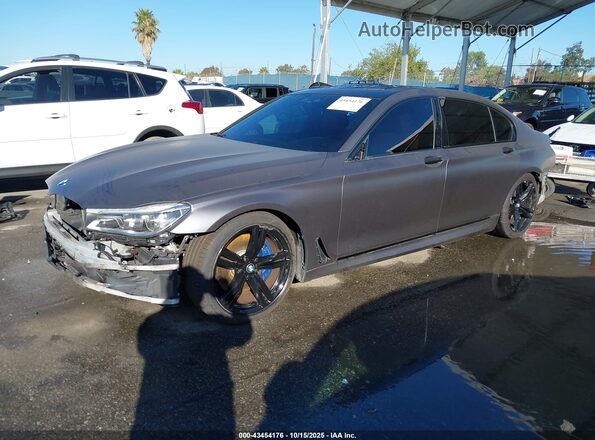 WBA7F0C30HGM22255 2017 BMW 7 SERIES Gray Առջևի ձախ երեք քառորդ տեսարան