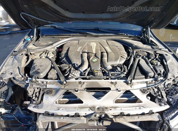 WBA7F0C30HGM22255 2017 BMW 7 SERIES Gray Հետևի տեսք