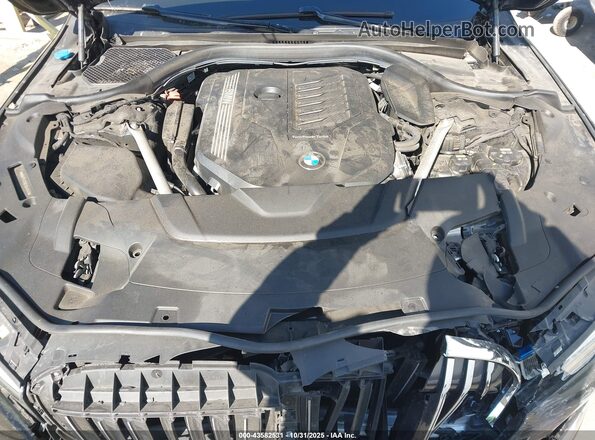 WBA7T4C06LCD44640 2020 BMW 7 SERIES Black უკანა ხედი