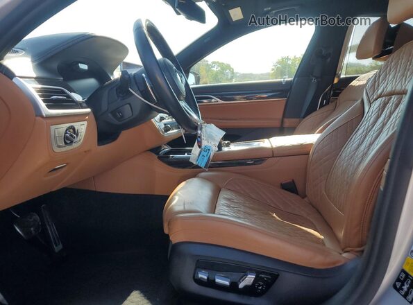 WBA7U2C00LGJ59569 2020 BMW 7 SERIES Серебряный Вид салона спереди