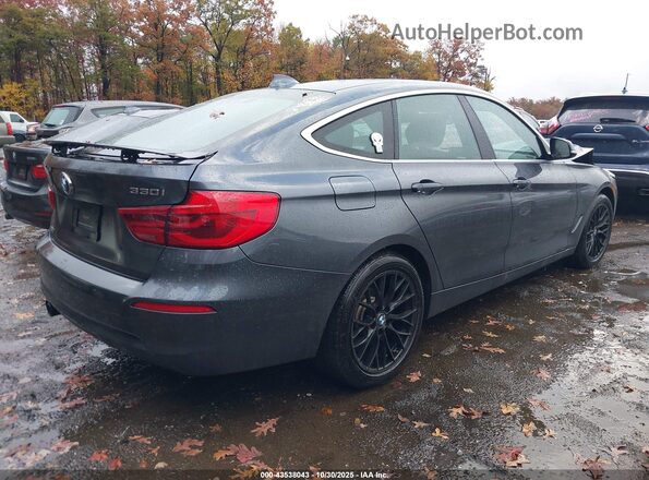 WBA8Z9C5XJB220186 2018 BMW 7 SERIES Gray 